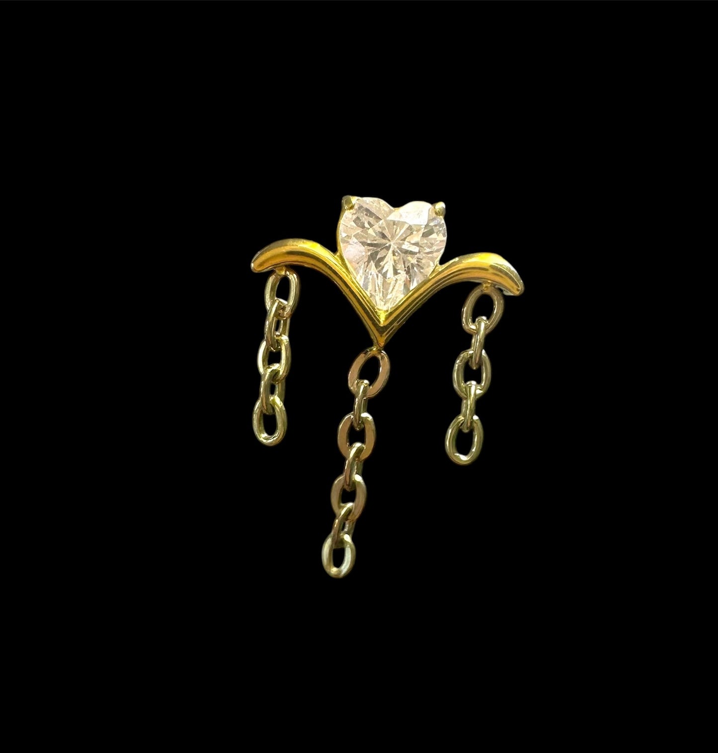 Piercing corazón con cadenas