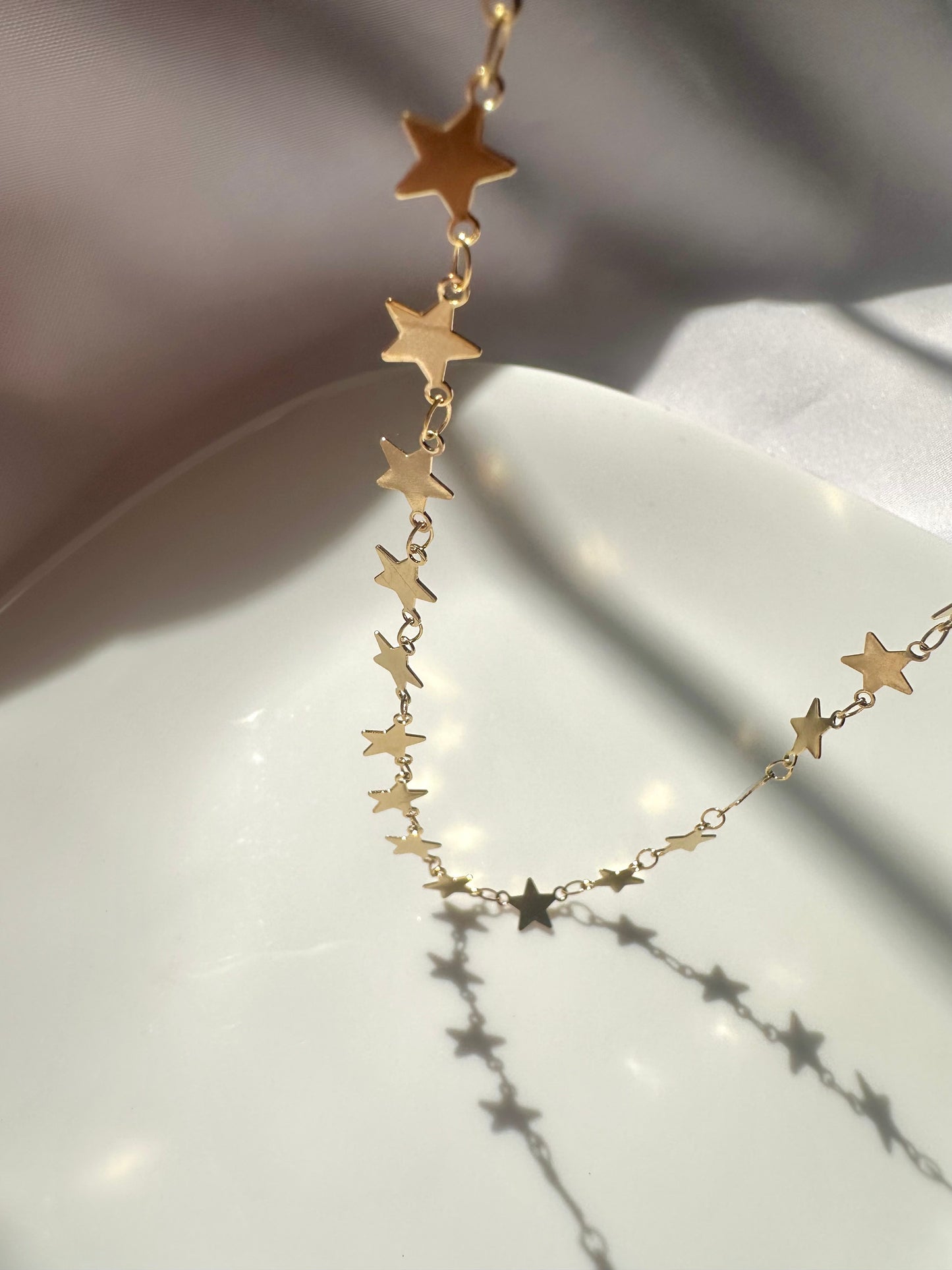 Collar estrellas dorado